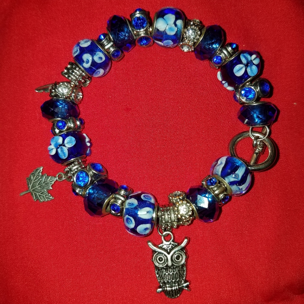 A blue murano charm bracelet